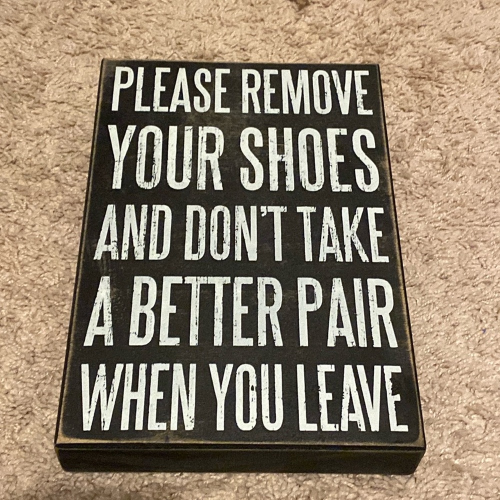 Wooden shoe sign